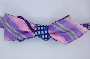 diamond point. pink and purple stripe with coloured spots on a blue back. Sold.