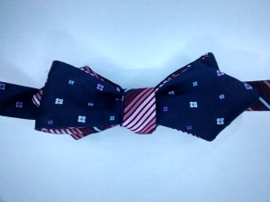 Diamond point.Floral pattern on blue with coloured stripe.