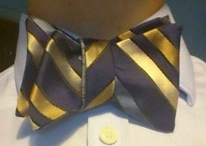 gold stripe on blue back with blue lines on silver.