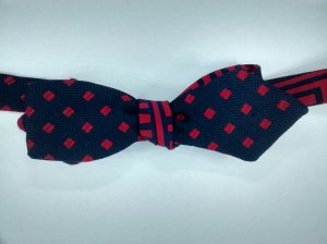 Blue with red spot vs red and blue Greek key pattern. Diamond point.